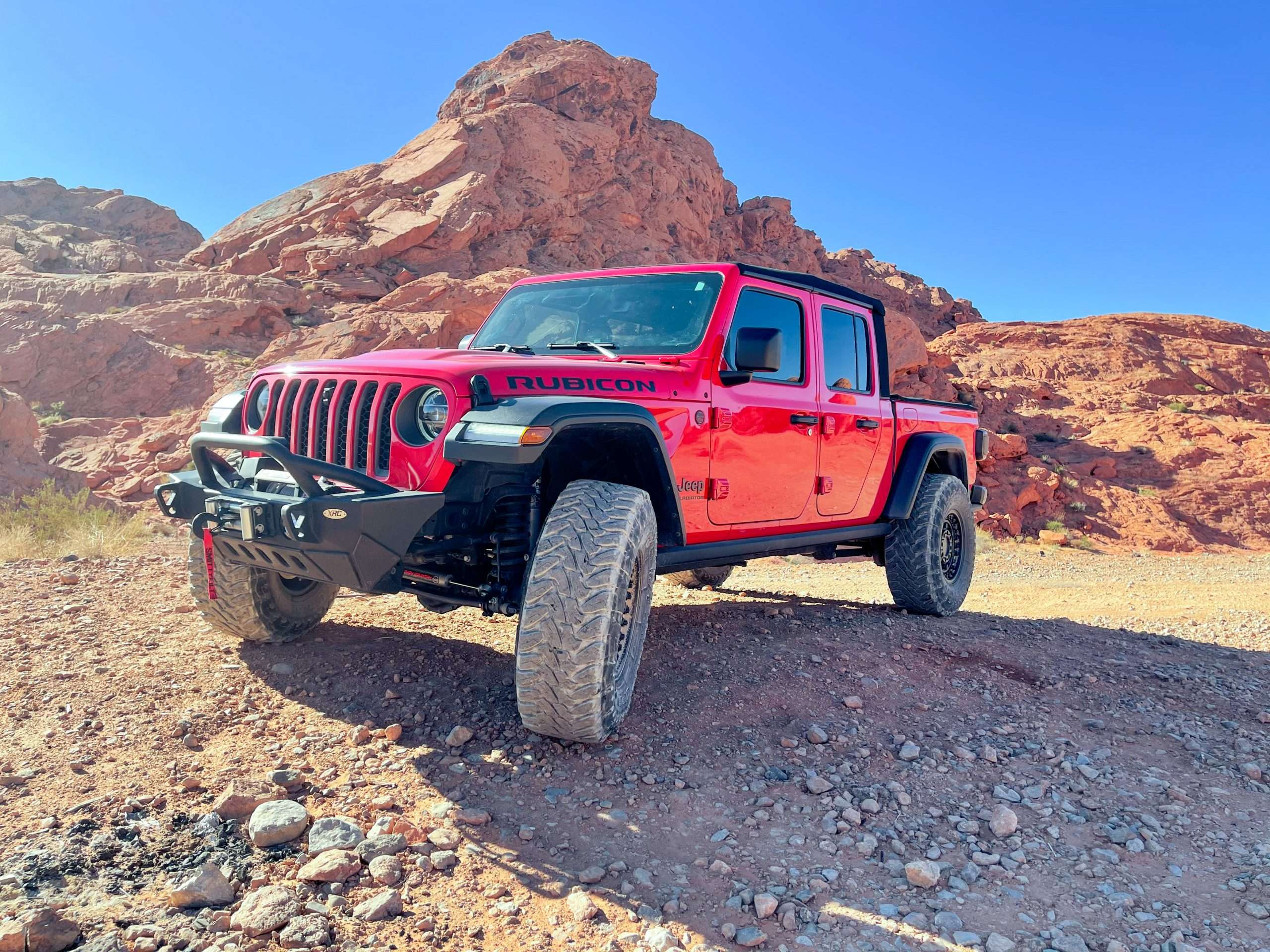 Custom red Jeep Gladiator in the Valley of Fire